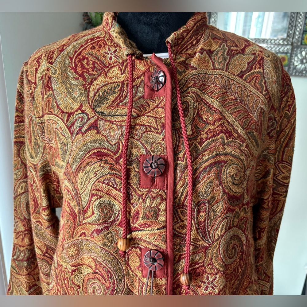 Vintage tapestry jacket with drawstring neckline and ornate wooden buttons